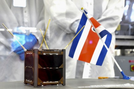 View of the first Costa Rican satellite constructed by students and professors of the Technological Institute of Costa Rica (TEC), during its presentation in Alajuela, El Coyol 25 kilometres West of San Jose on October 23, 2017. The Irazu project -aimed at monitoring carbon levels in Costa Rican forests- is the first Central American space mission developed by TEC students and professors. The satellite will be launched into space in March 2018 from the international space station. / AFP PHOTO / Ezequiel BECERRA